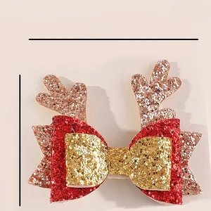 Pince à cheveux de Noël bois de renne pailletés avec nœud, accessoire festif 8x7cm