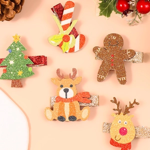 5-piece glittery Christmas hair clips set with reindeer gingerbread man and tree