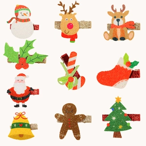 9-piece Christmas hair clip set with glitter snowmen, reindeer, and Santa Claus patterns