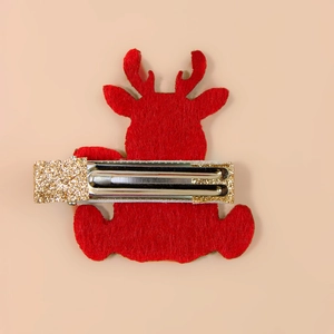 Christmas reindeer hair clip made of red felt with a gold sequin-wrapped metal alligator clip