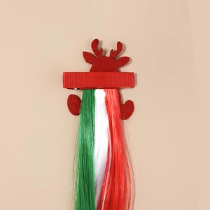 Christmas reindeer hair clip with festive red felt and long colorful wig tassel trim