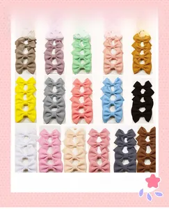 Set of colorful bubble texture bow hair clips for girls in various pastel shades