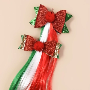 Christmas hair clips with red and green glitter bows and colorful synthetic hair extensions