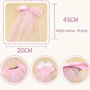 Barrette à nœud rose avec voile en tulle 45cm de long et pince à ressort métallique