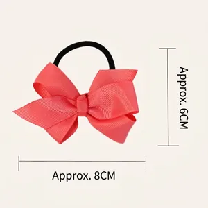 Pink ribbed ribbon bow hair tie for children, multi-layered design with elastic band