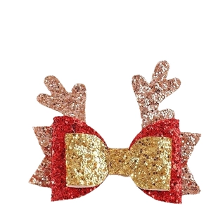 Pince à cheveux de Noël avec nœud en paillettes et bois de renne pour les fêtes