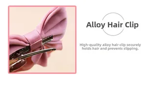 Détail de la pince à cheveux noeud rose montrant le clip en alliage avec dents antidérapantes
