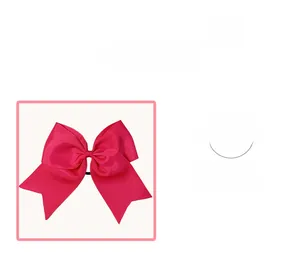 Detail view of a large layered peach pink bow scrunchie with soft silky ribbon texture