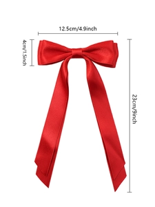 Detail showing red satin bow hair clip dimensions 12.5cm width and 23cm total length