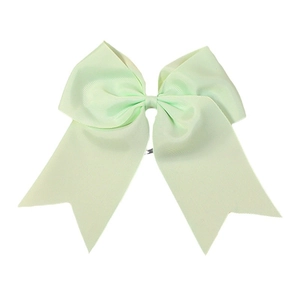 Mint green grosgrain ribbon hair bow with swallowtail tails on white background