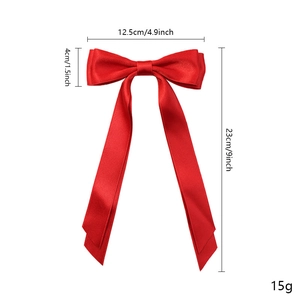 Elegant red satin bow hair clip with long ribbons featuring detailed size measurements