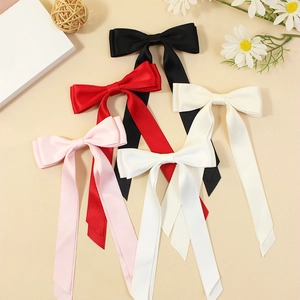 Elegant satin long ribbon bow hair clips in black, red, pink, and white colors