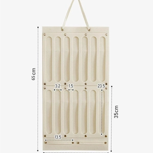 Hanging felt organizer for hair clips and jewelry with 14 slots, dimensions 65x35cm