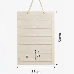 Cream felt hair accessory hanging organizer with storage pockets and 50x35cm dimensions