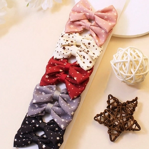 Lot de 5 barrettes à nœuds en tissu texturé avec imprimés étoiles en cinq couleurs variées