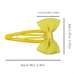 Bright yellow grosgrain ribbon bow hair clip on a metal BB snap clip with dimensions