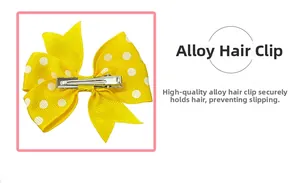 Detail of yellow polka dot ribbon bow with non-slip silver alloy alligator hair clip