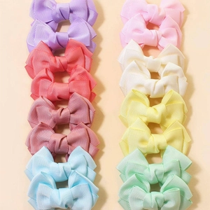 Set of 10 colorful grosgrain ribbon bow hair clips in vibrant macaron shades