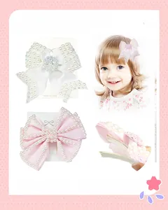 Detail of handmade pearl bow hair clips with rhinestones for girls and women