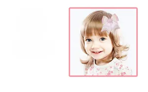 Close-up of pink silk bow hairclip with pearls and rhinestones for daily elegant look