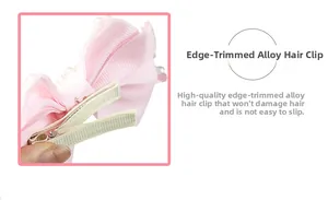 Detail of pink ribbon bow hair clip with pearls and protective alloy edge finish