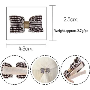Brown and white checkered fabric bow hair clip with fully wrapped safety alligator base