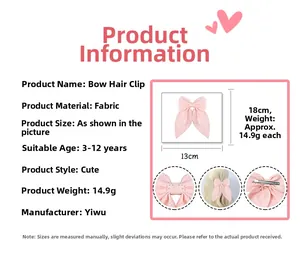Detail showing pink fabric bow hair clip size 18x13cm with rhinestones for kids