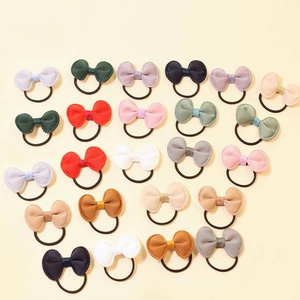 Set of 23 colorful mini bow hair ties in various Morandi tones with elastic bands