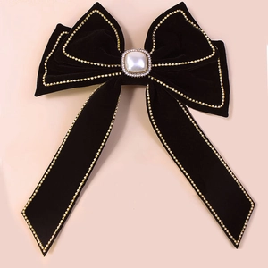 Elegant large black velvet bow hair clip with faux pearl center and gold bead trim