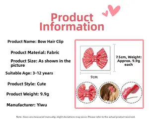 Detail view of pink rhinestone bow hair clip with measurements and fabric texture details