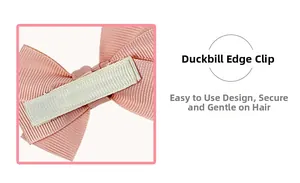 Detail of pink bow hair clip showing the safe fabric-wrapped metal duckbill clip