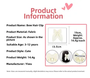 Detail view of large fabric bow hair clip with dimensions 13.5cm by 19cm and specifications