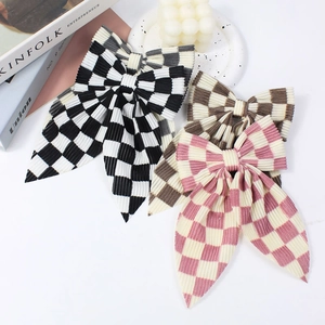 Barrettes à cheveux élégantes avec nœuds en velours côtelé à damier noir et rose