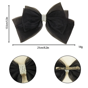Large black triple-layer mesh bow hair clip with elegant pearl center and spring clip