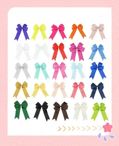 Detailed set of 25 colorful grosgrain ribbon hair bows with long tails for girls