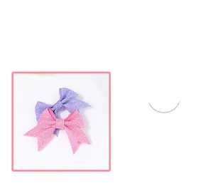 Close-up of pink and purple sequin bow hair clips for girls with glitter fabric texture