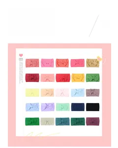 Detailed palette of 25 colorful soft nylon bow headbands for babies and toddlers