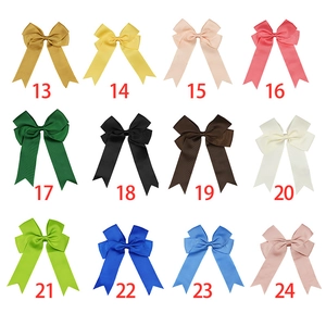 Set of 12 colorful grosgrain ribbon hair bows with long tails for girls on white background