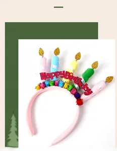 Detail of colorful birthday party headband with plush candles and sparkling letters