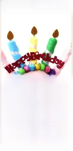 Detail of Happy Birthday headband with colorful candles, sequins and soft plush texture