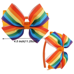 Detail showing the 4.5 inch rainbow grosgrain ribbon bow headband with dimension marking