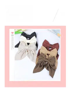 Lot de cinq barrettes à nœuds en satin noir blanc crème bordeaux et marron détails