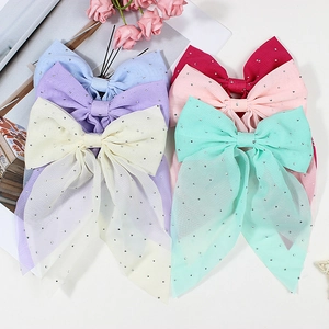 Barrettes à cheveux à nœuds multicolores élégants avec strass et rubans fluides