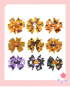 Set of 9 Halloween hair clips with pumpkins, ghosts and bats on printed grosgrain ribbon