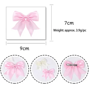 Pink satin ribbon bow hair clip with dimensions 9x7cm and lightweight metal duckbill clip