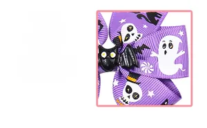 Detail of Halloween purple ribbon bow featuring ghost prints and a black bat centerpiece