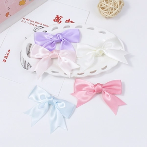 Set of five colorful satin bow hair clips for girls in macaron shades of silk ribbon
