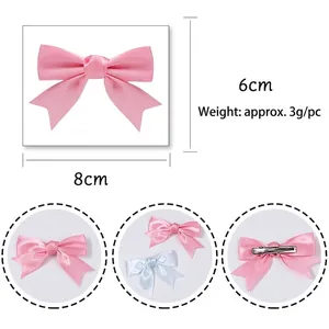 Pink handmade satin bow hair clip for children with measurements and metal duckbill clip