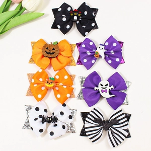 Lot de sept pinces à cheveux Halloween avec paillettes et motifs citrouille fantôme