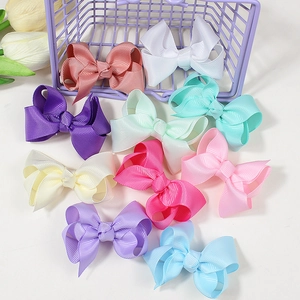 Handmade 3-inch colorful grosgrain ribbon hair bows for kids in various pastel colors